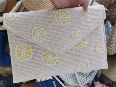 Ženska torba za kvačilo s papirnim vezom